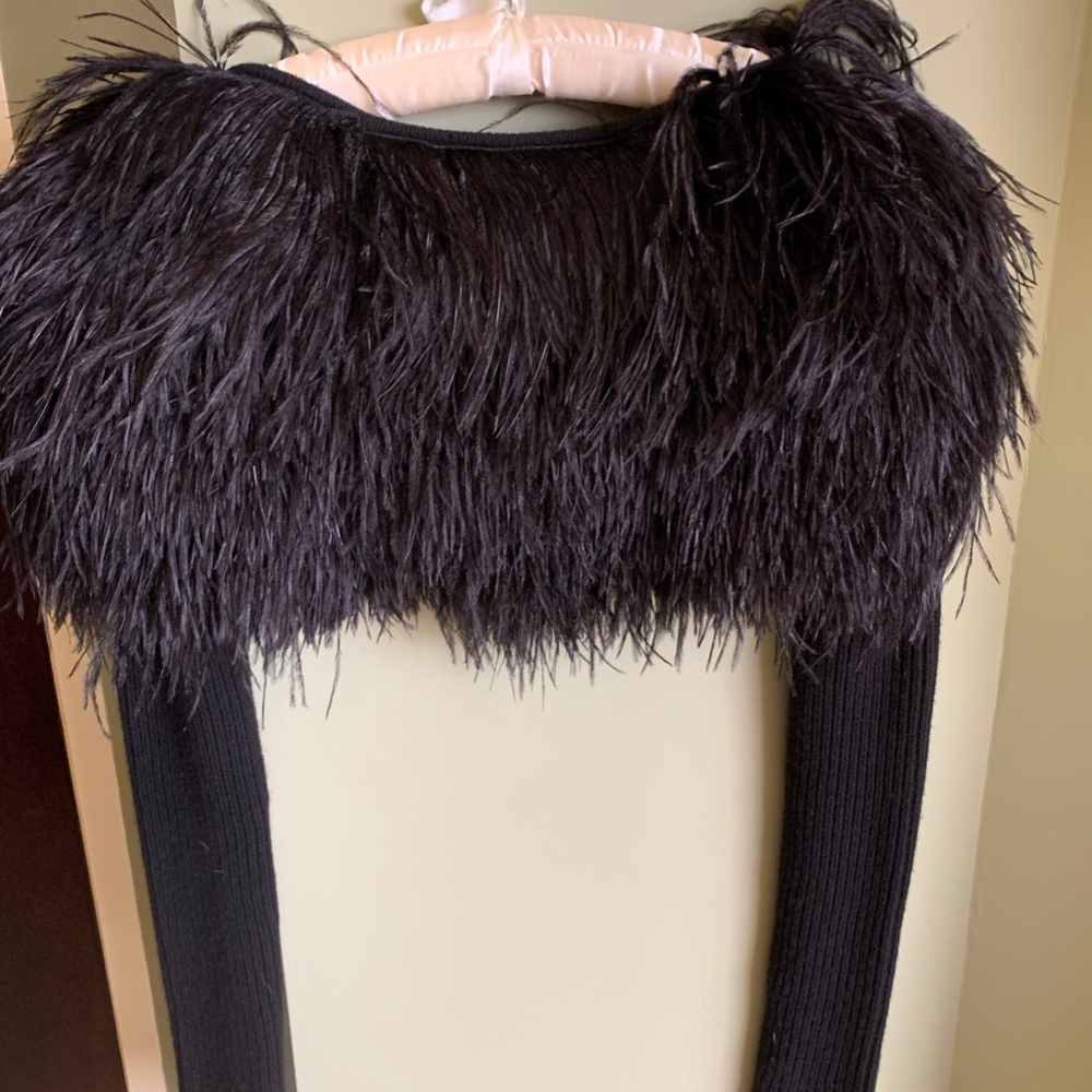 Robert Rodriguez Ostrich Shrug